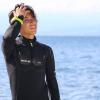 male diver wearing wet suit