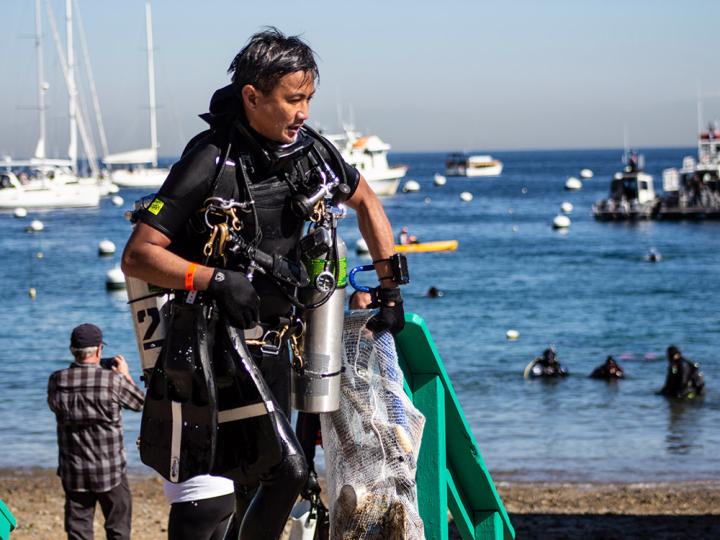 Diver cleaning up debris.