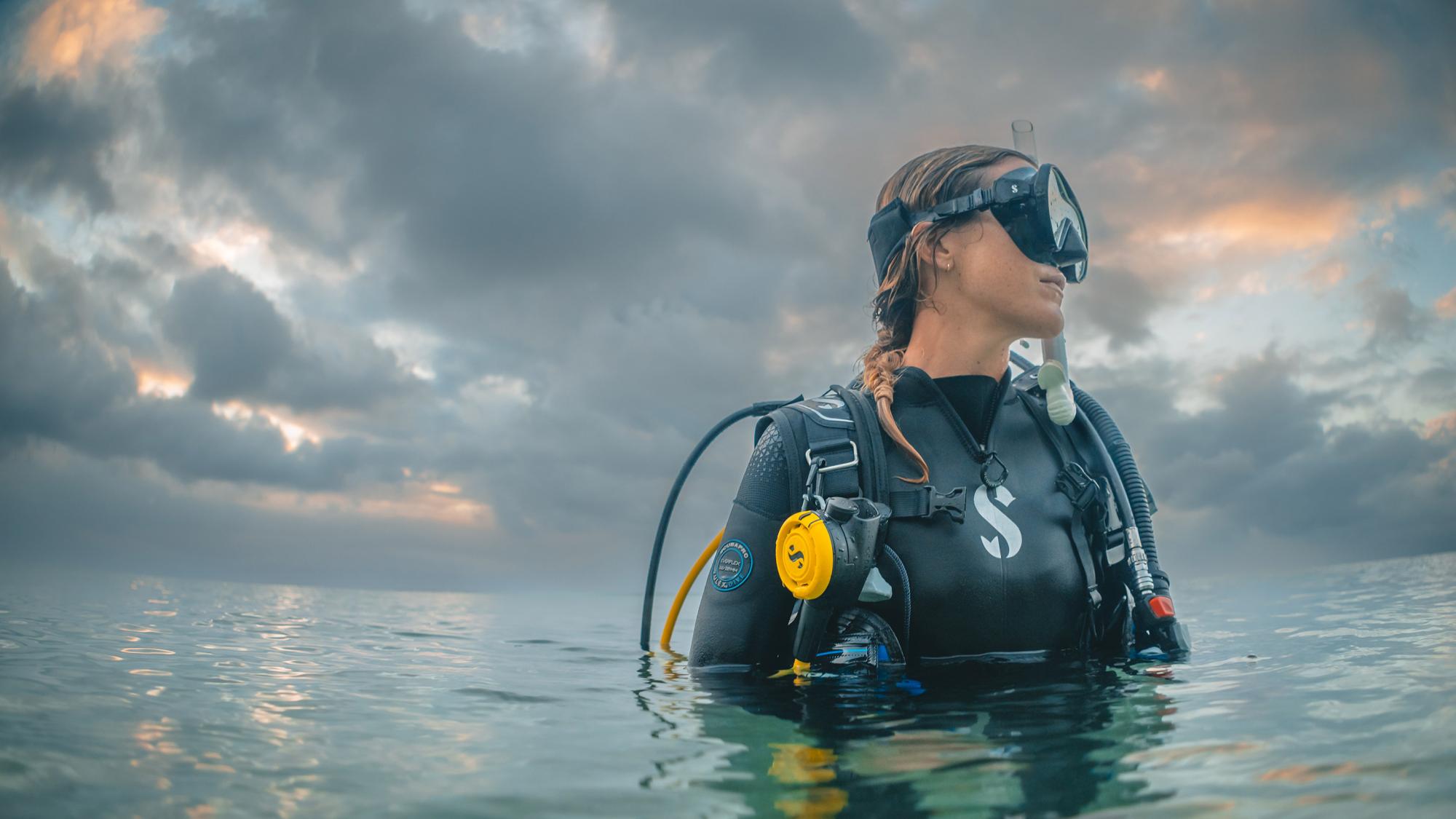 A female diver as she rises from the water